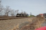 NS 1162 and 9933 take a stack train west